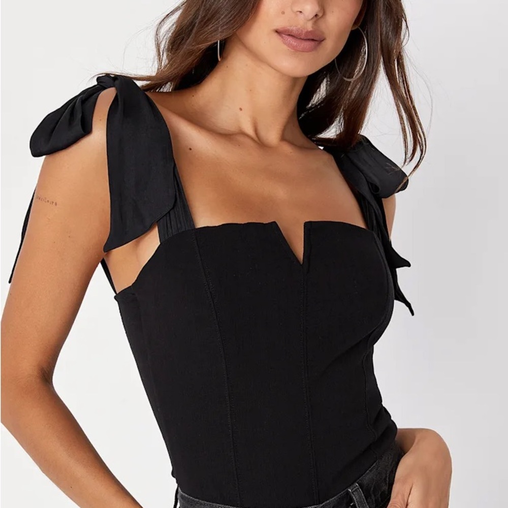 Free People’s Lola Bow Bodysuit